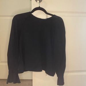 Mango black blouse or shirt. Ruffles in the sleeves with cute buttons details.